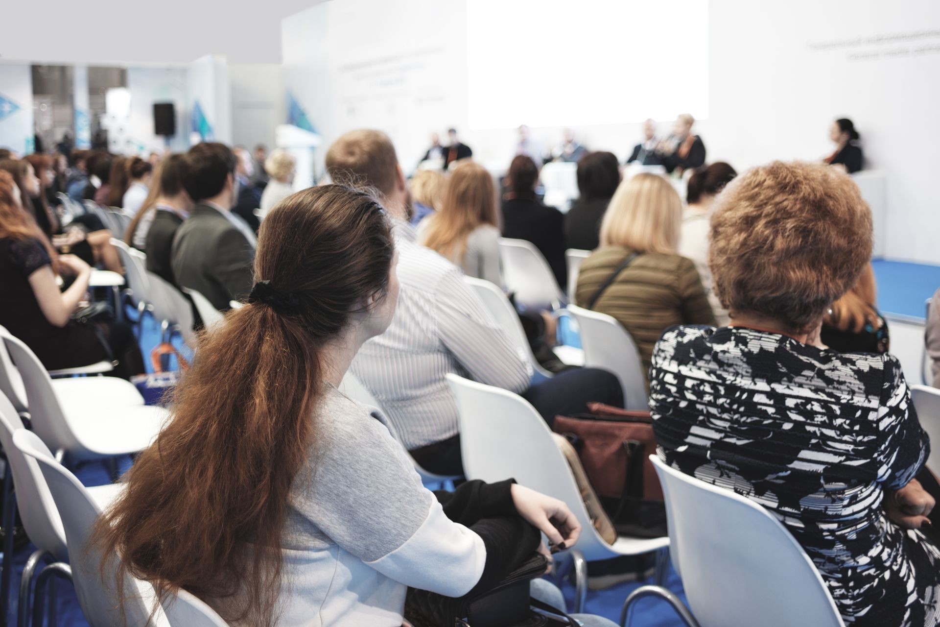 Business woman and people Listening on The Conference. Horizontal Image